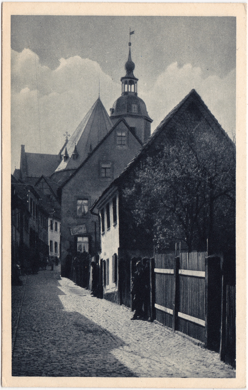 vergrößern: Bildseite historische Ansichtskarte von 1955: Partie in der Friedensstrasse:: Penig (Mulde)