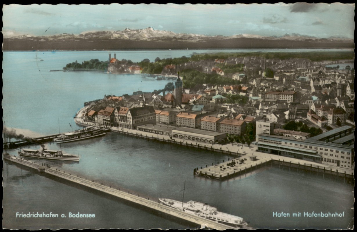 vergrößern: Bildseite historische Ansichtskarte von 1962: Luftbild Bodensee Hafen mit Hafenbahnhof:: Friedrichshafen