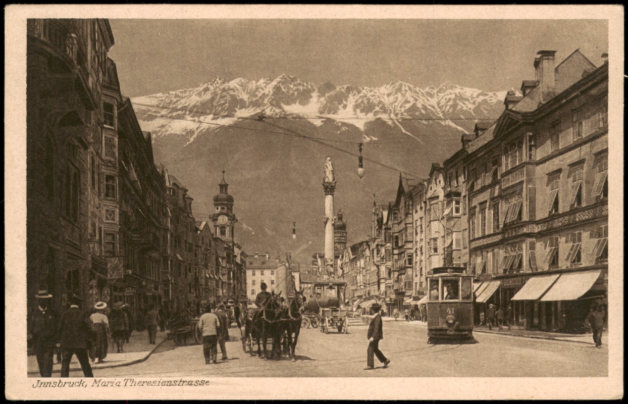 vergrößern: Bildseite historische Ansichtskarte von 1910: Maria-Theresien-Straße mit Annasäule und Nordkette:: Innsbruck