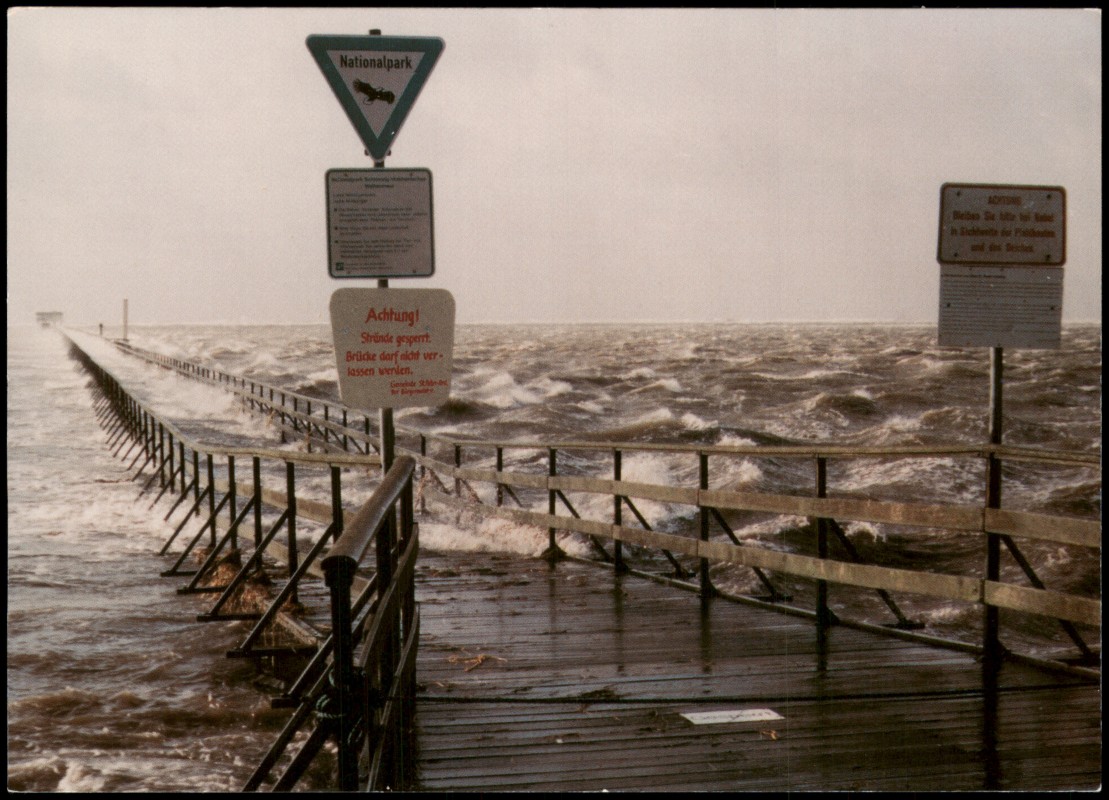 zoom: Image side vintage Postcard from 2010: Sturmflut an der Seebrücke:: St. Peter-Ording