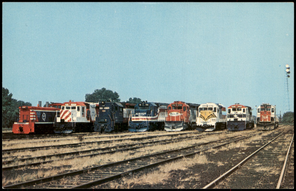 vergrößern: Bildseite historische Ansichtskarte von 1977: Eisenbahn Zug Lokomotive BICENTENNIAL LINEUP Railroad USA::